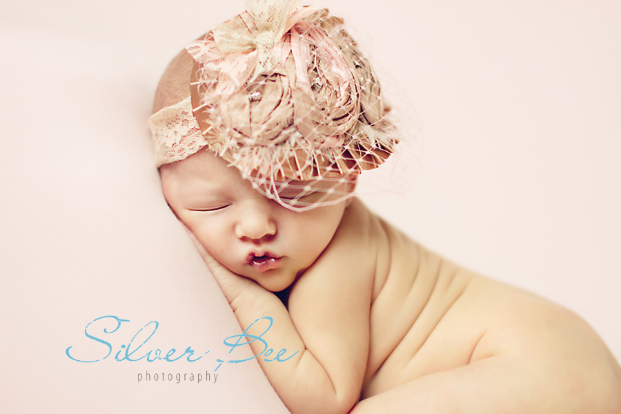 Baby with newborn cage veil