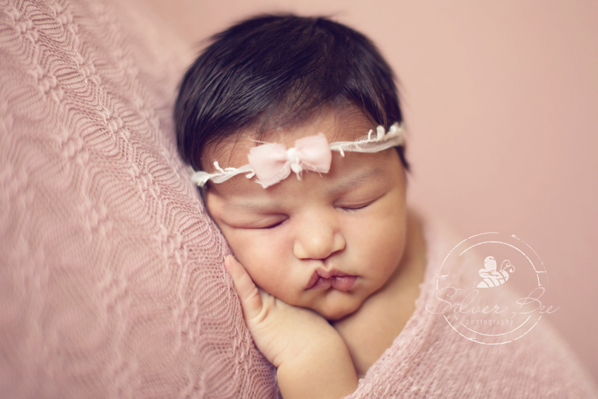 One week old newborn baby girl in Austin Texas newborn photography session