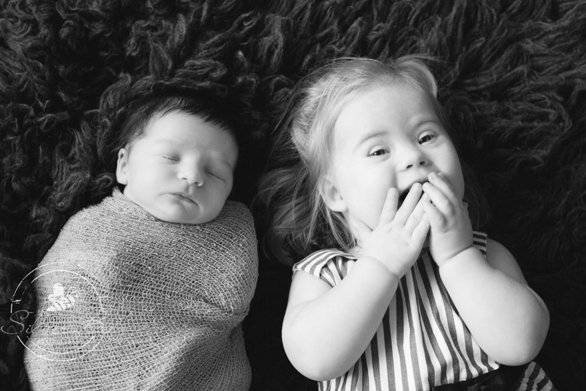 Austin Newborn Photography: Sibling shot with newborn baby boy.