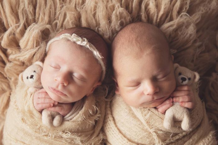 Boy/girl twin newborn photos holding tiny teddy bears | Silver Bee Photography