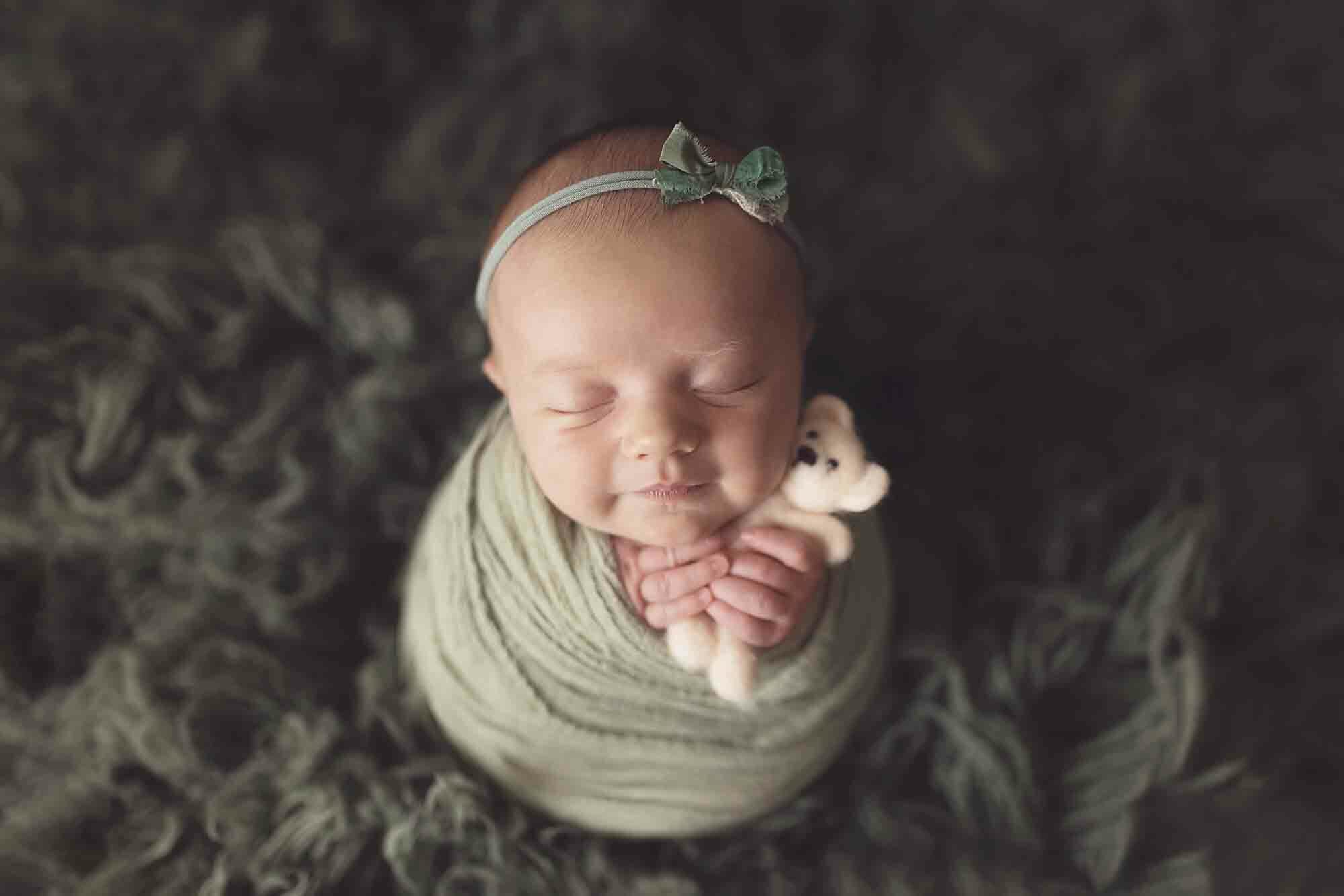 How to choose the best newborn photographer for you.